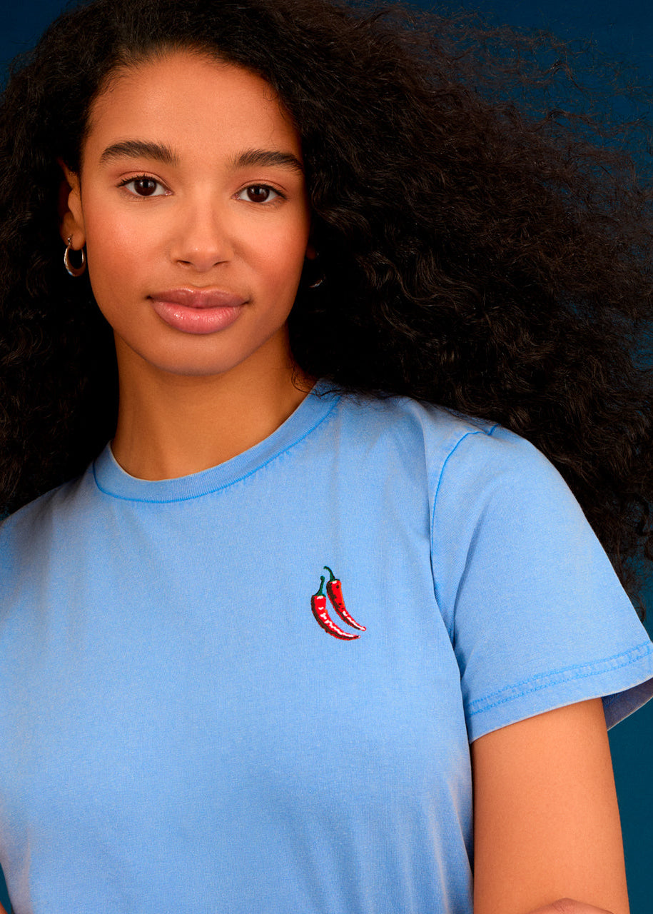 a women wearing a t-shirt embroidered chilli top 
