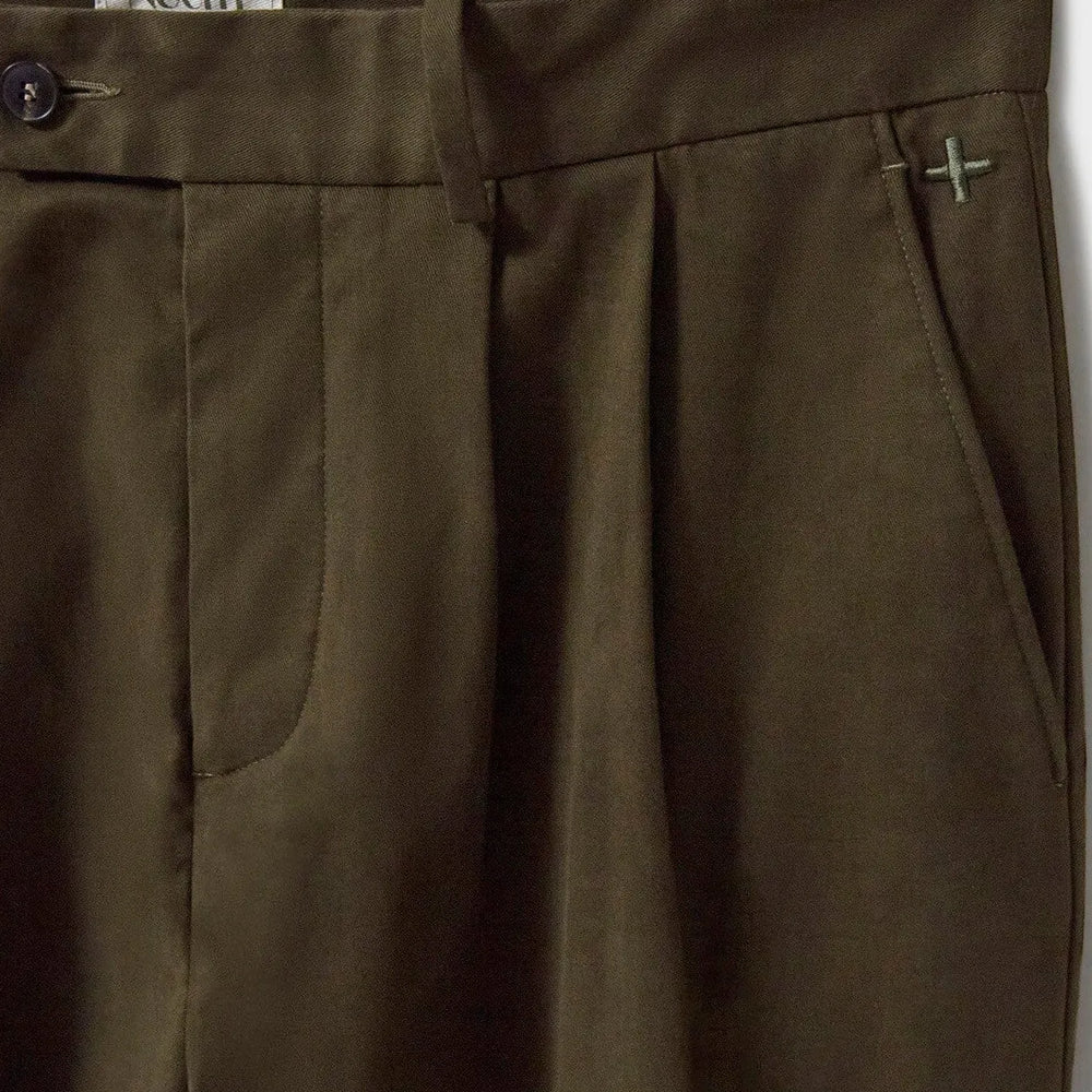 
                  
                    Organic Cotton stretch Deep Neem Green Pleated Trouser
                  
                