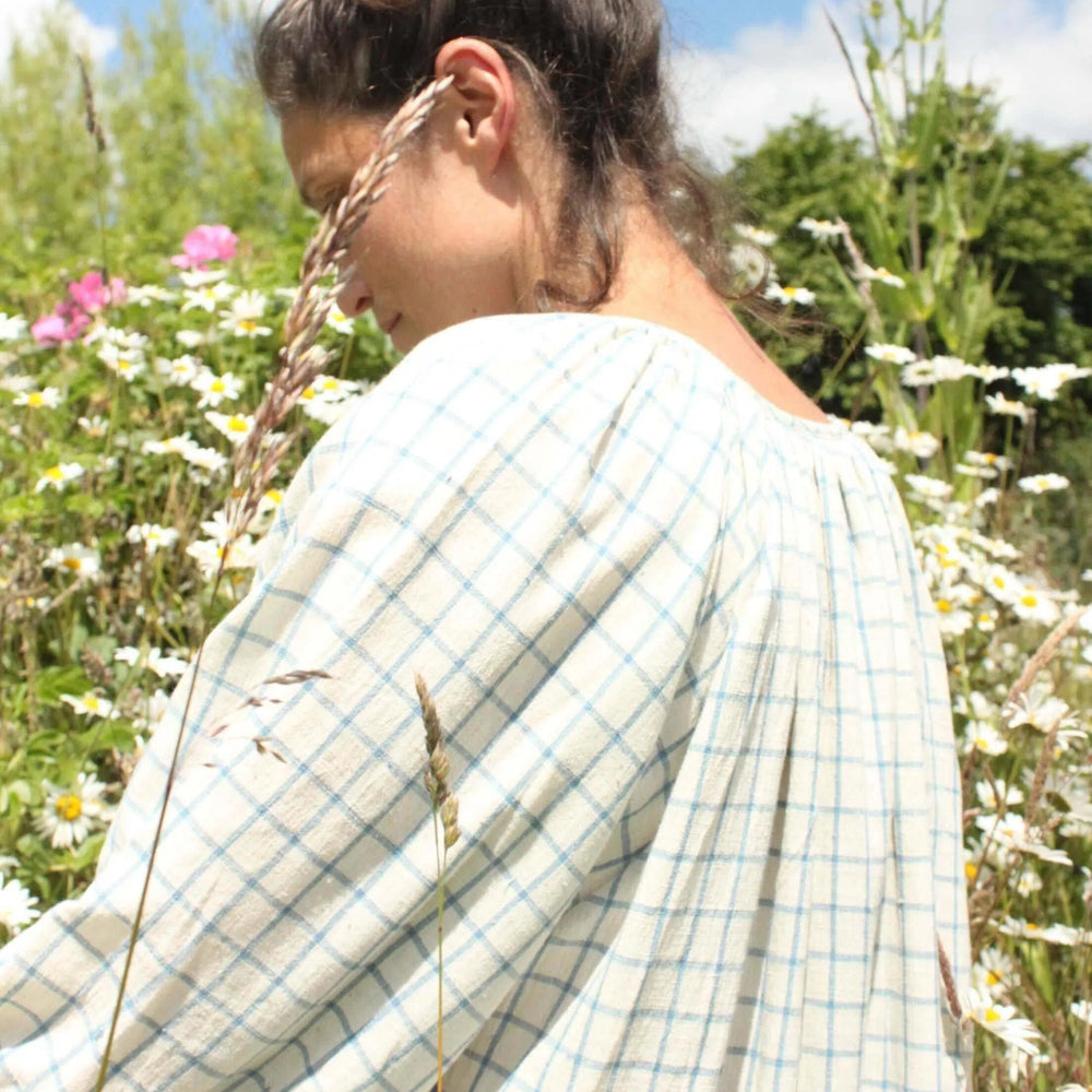 
                  
                    Grace Dress in light blue check
                  
                