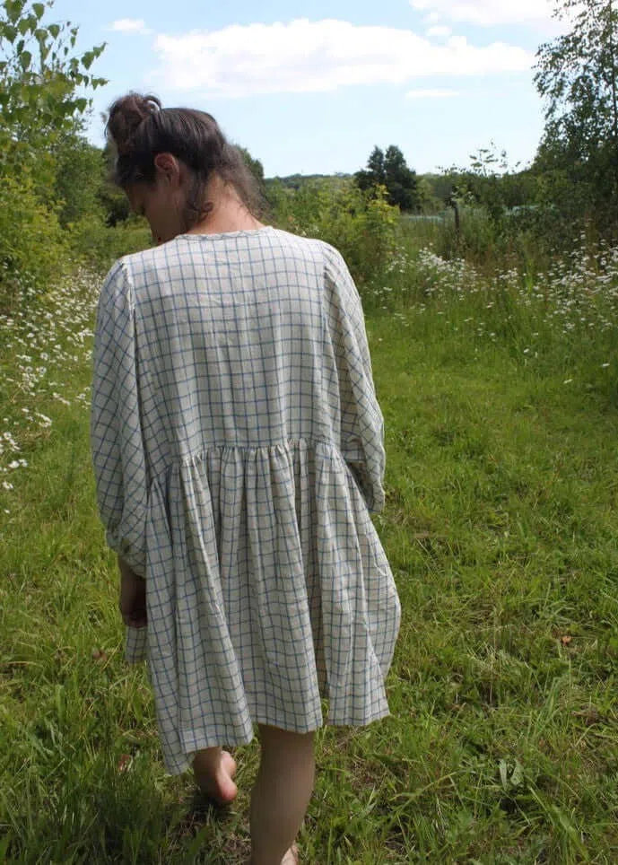 
                  
                    Jennifer Smock Dress in light blue check
                  
                