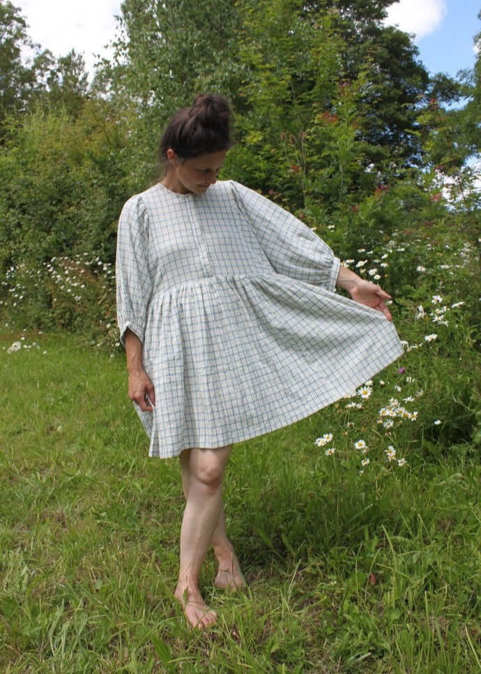 
                  
                    Jennifer Smock Dress in light blue check
                  
                