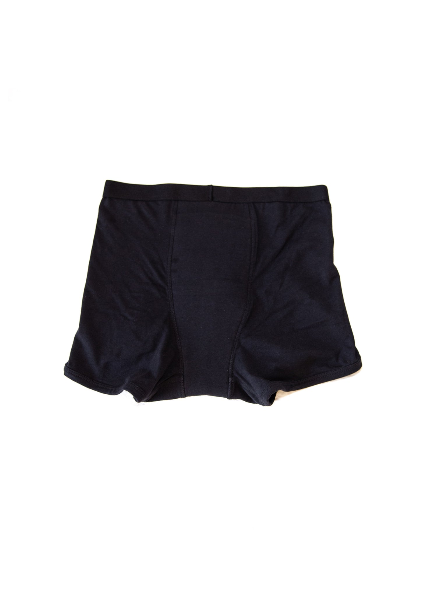 Black athletic shorts on a white background