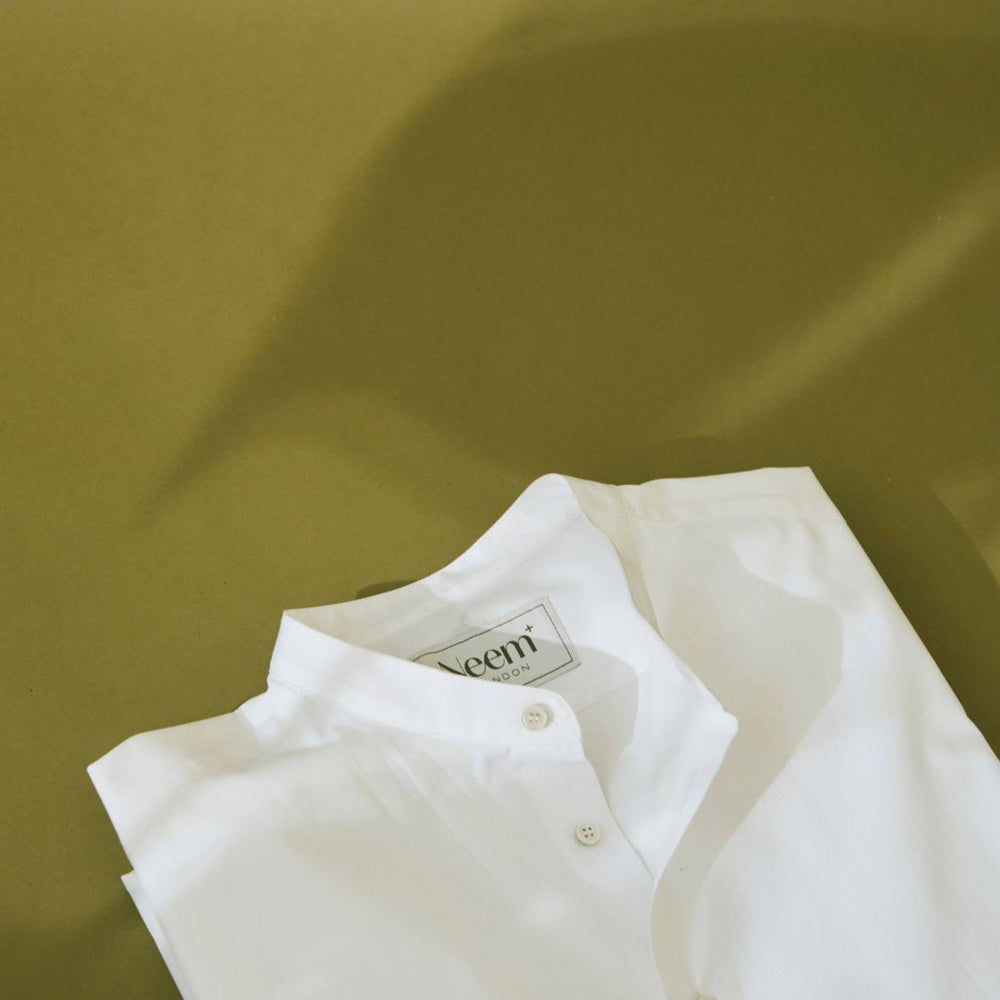 
                  
                    Regenerative Cotton Poplin White Nehru Shirt
                  
                