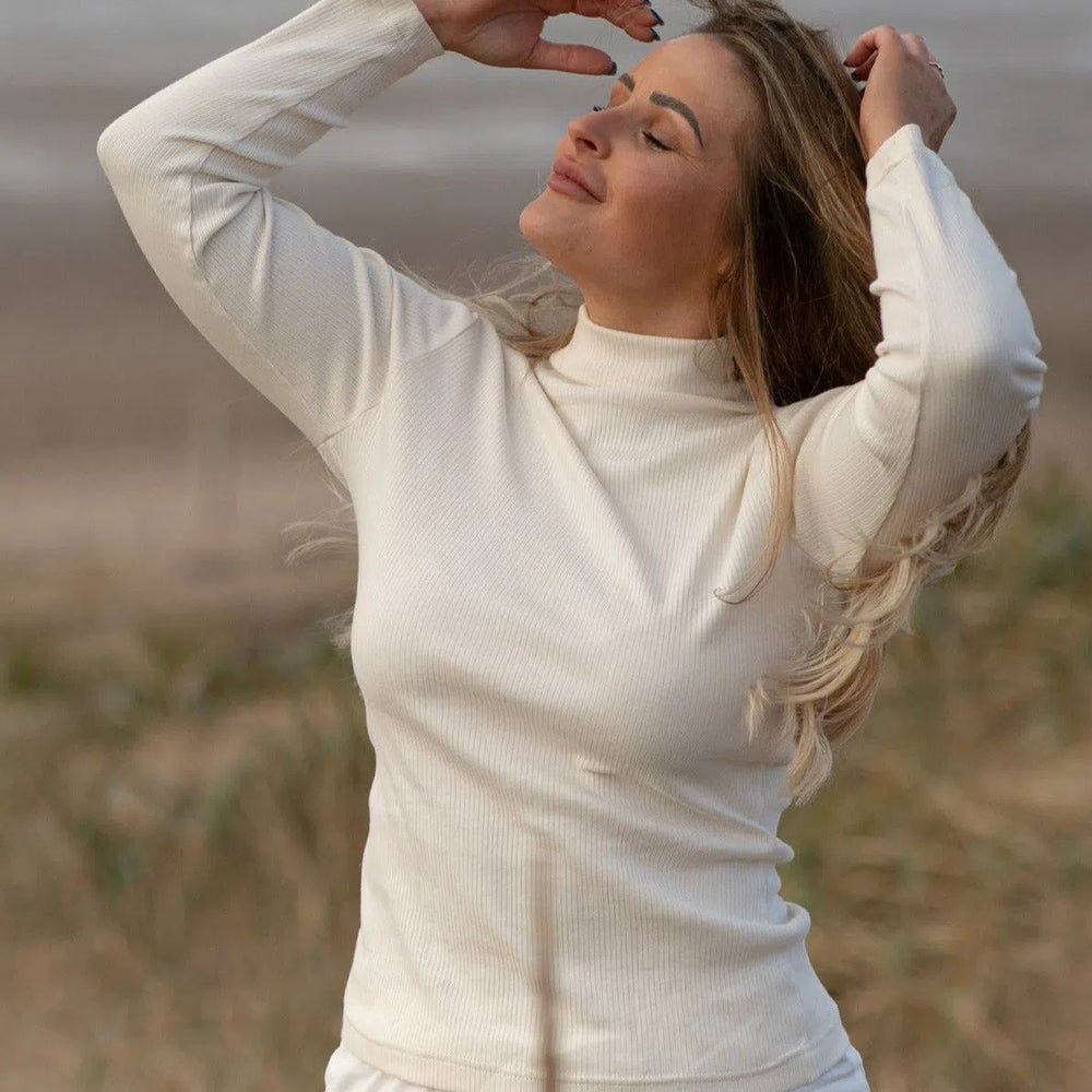 
                  
                    The Organic Cotton Mock Neck
                  
                